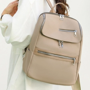 Minimalist large capacity nylon backpack in beige khaki for travel and casual school use