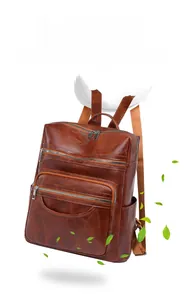 Close-up of brown PU leather backpack featuring leaf texture and lightweight 0.54KG design