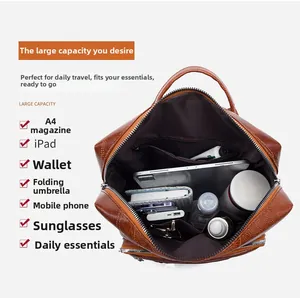 Top view of spacious brown PU leather backpack interior holding tablet and umbrella