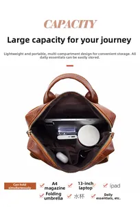 Brown vintage leather backpack interior showing large capacity for 13 inch laptops