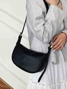 Minimalist black lychee pattern leather crescent shoulder bag with gold hardware