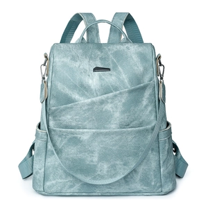 Fashionable light blue-green faux leather backpack for women with textured finish