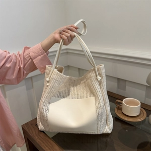 Large capacity woven straw tote bag for women with beige faux leather patch detail