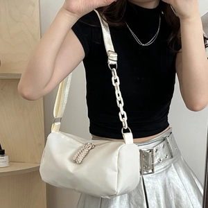White minimalist nylon shoulder bag with plastic chain strap and silver metal buckle