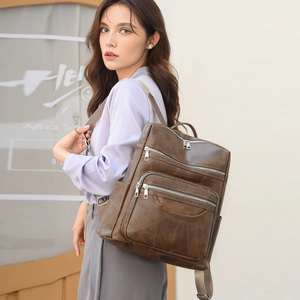 Vintage brown PU leather women's backpack with multi-zipper compartments and large capacity