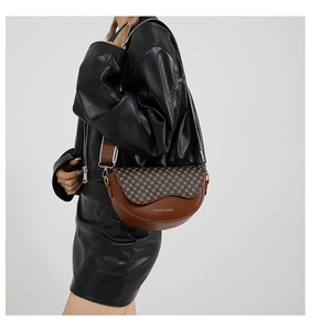 Braune halbrunde Satteltasche mit gepunktetem Print und verstellbarem breitem Gurt