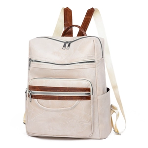 Chic beige PU leather backpack with vintage textures and functional zippers for travel