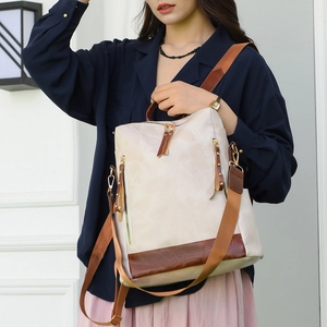 Chic beige and brown PU leather backpack for women with geometric stitching and tassel detail
