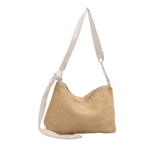Fashionable woven straw tote bag with white leather strap and silver chain details