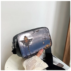 Detail of Halloween print crossbody bag with double zipper and wide shoulder strap