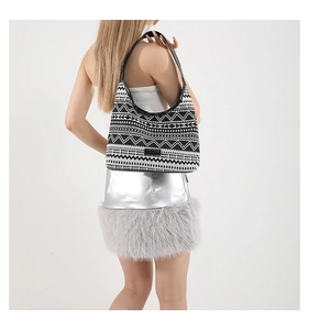 Detail of black and white geometric ethnic pattern on large canvas tote bag for women