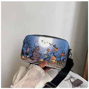 Detail of Halloween square crossbody bag with pumpkin illustrations and wide strap