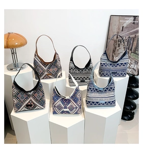 Detailed view of bohemian geometric pattern woven tote bags in various ethnic designs