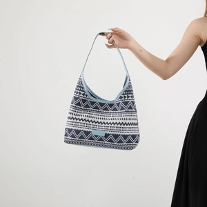 Ethnic style woven canvas tote bag with geometric patterns and shoulder straps for women