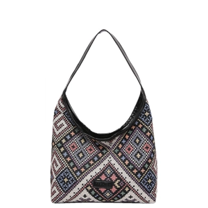 Ethnic embroidery tote bag with geometric patterns and black leather handles on white background