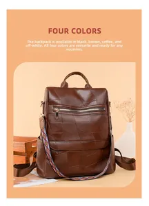 Detail of dark brown vintage faux leather backpack with colorful ethnic woven strap accent