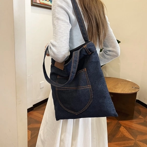 Large capacity navy denim tote bag with contrast stitching and shoulder straps