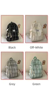 Detailansicht vierfarbiger Karo-Canvas-Rucksäcke in Schwarz, Beige, Grau und Grün