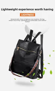 Detail of lightweight black PU leather backpack with bohemian pattern woven straps