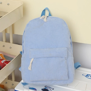 Sac à dos en velours côtelé bleu clair pour femme avec poche avant et tissu texturé