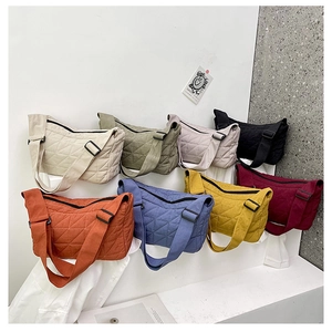 Detailed grid display of quilted dumpling bags in various vibrant colors and wide straps
