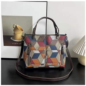 Detailed view of the 3D geometric pattern and lychee texture on this stylish tote bag