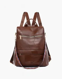 Coffee brown patchwork PU leather backpack featuring ethnic style colorful shoulder strap