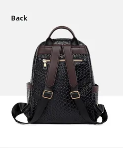 Rear view of woven leather backpack showing anti-theft zipper pocket and brown straps