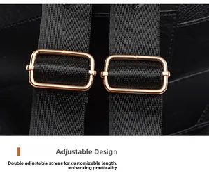 Detail of adjustable nylon straps and rose gold buckles on a black PU leather backpack