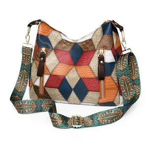 Macro view of multi-textured leather patchwork and geometric patterns on a tote bag