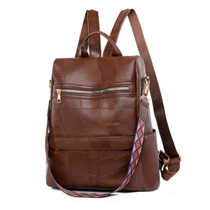 Deep brown patchwork PU leather backpack for women with colorful ethnic jacquard strap