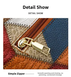 Macro shot of smooth gold zipper on vintage multi-color faux leather tote bag