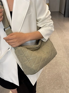 Modern olive green quilted crossbody bag with large capacity and adjustable wide strap