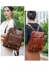 Detail of durable PU leather backpack showing textured stitching and gold metal buckle