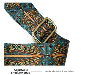 Macro detail of adjustable woven shoulder strap with geometric pattern and gold buckle