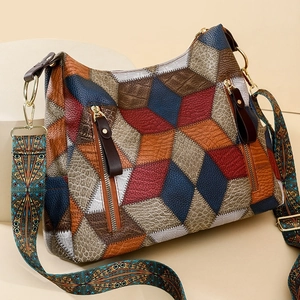 Vintage patchwork shoulder bag with geometric star pattern and wide colorful strap