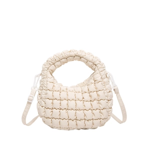 Cream beige popcorn textured crescent tote bag with a matching adjustable shoulder strap
