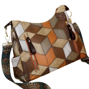 Vintage patchwork shoulder bag for women with geometric leather patterns and wide strap