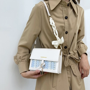 White faux leather and blue tweed shoulder bag with silk scarf strap and golden charms
