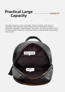 Detail view of large capacity black leather backpack interior showing 31x35x13cm dimensions