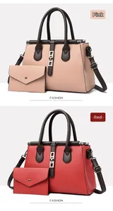 Close-up of pink and red pebbled leather handbags with detachable shoulder straps and clutch