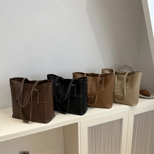Large vintage tote bags in four colors with contrast stitching and dual shoulder straps