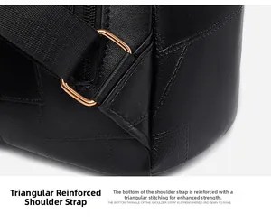Detail of reinforced triangle stitching and gold metal buckle on black leather backpack