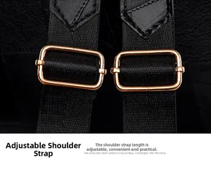 Detail of adjustable black shoulder straps with elegant rose gold metal buckles