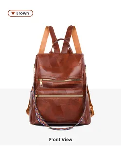 Close-up of brown patchwork faux leather backpack with colorful woven shoulder strap