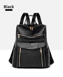 Détails du sac à dos noir pour femme en cuir avec surpiqûres et fermetures éclair dorées