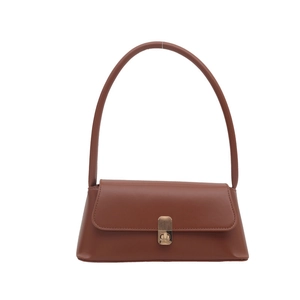 Retro brown baguette shoulder bag with matte leather finish and golden metal buckle