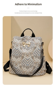 Detail of vintage wave print backpack featuring golden bow metal buckle and black handles