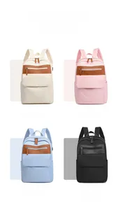 Showcasing four stylish Oxford fabric backpacks in white, pink, blue, and black colors