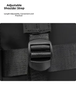 Detail of adjustable nylon shoulder strap and durable buckle on black travel backpack